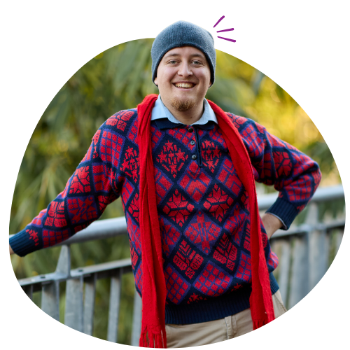 Young person smiling in daggy jumper